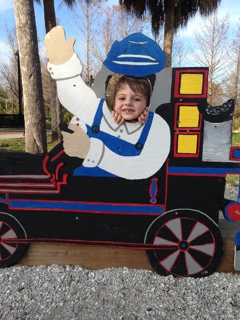 little boy in train cut out at Lakes park