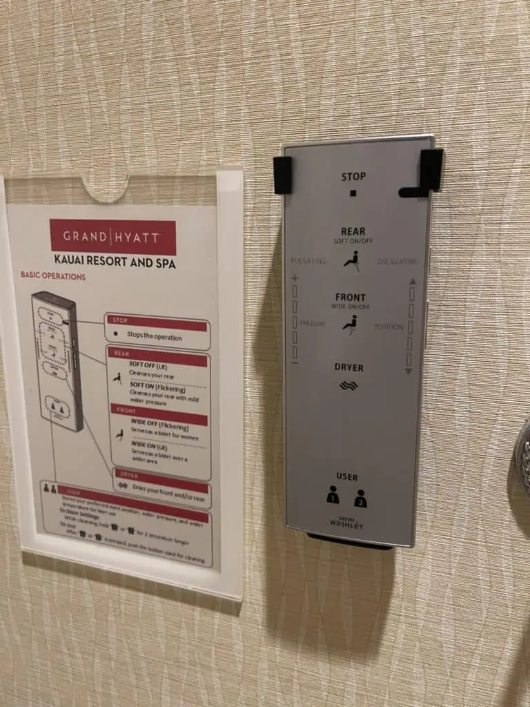 Bidet remote in Grand Hyatt Kauai guest room bathroom.