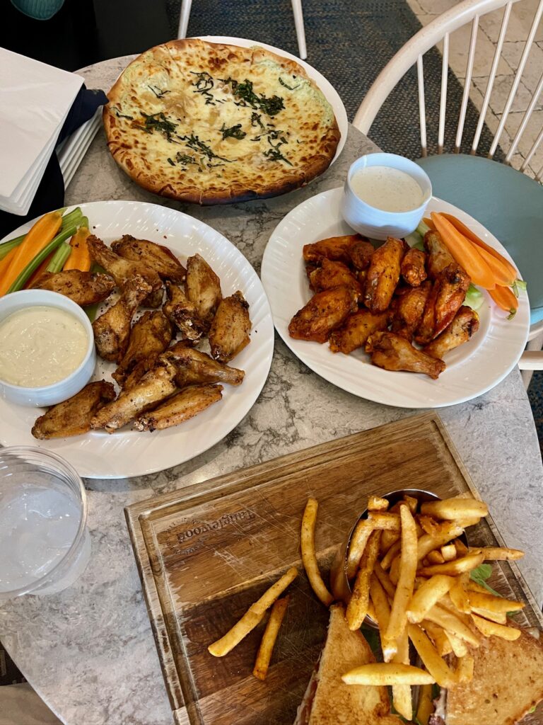pizza, wings and French fries ordered from Mangrove Bar at Hyatt Regency Coconut Point