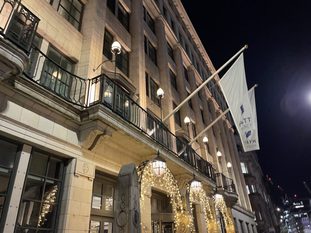 Exterior of Hyatt Regency London Blackfriars at night.
